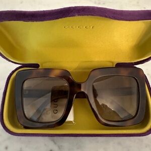 Gucci sunglasses never worn!!